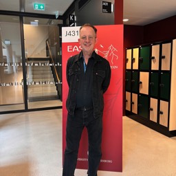 Prof. Gary R. Bunt, EASR 2024, Gothenburg University. Set against the red banner of the EASR 2024 Conference.