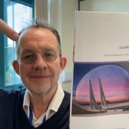 Prof Gary R. Bunt holding the paperback edition of 'Islamic Algorithms' (December 2025)