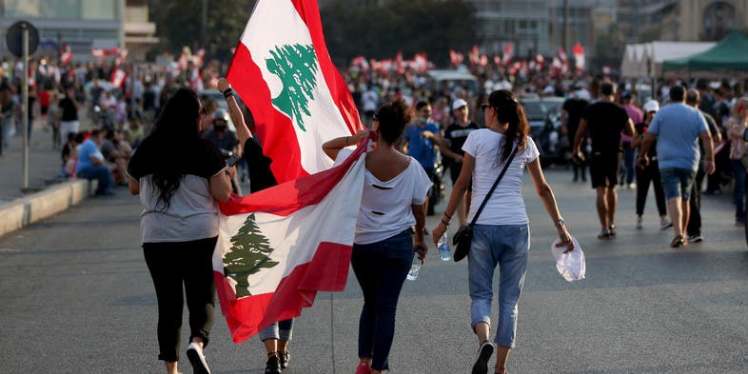 Men-women-and-children-gathered-in-the-Lebanese-capital-Beirut-Sunday-to-protest-corruption-and-tax-hikes-for-a-fourth-day.-AFP